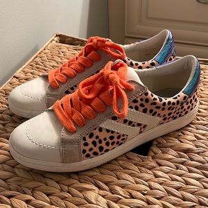 Dolce Vita Like New Sneakers. Cheetah print w/ orange laces &metallic heel. 8.5